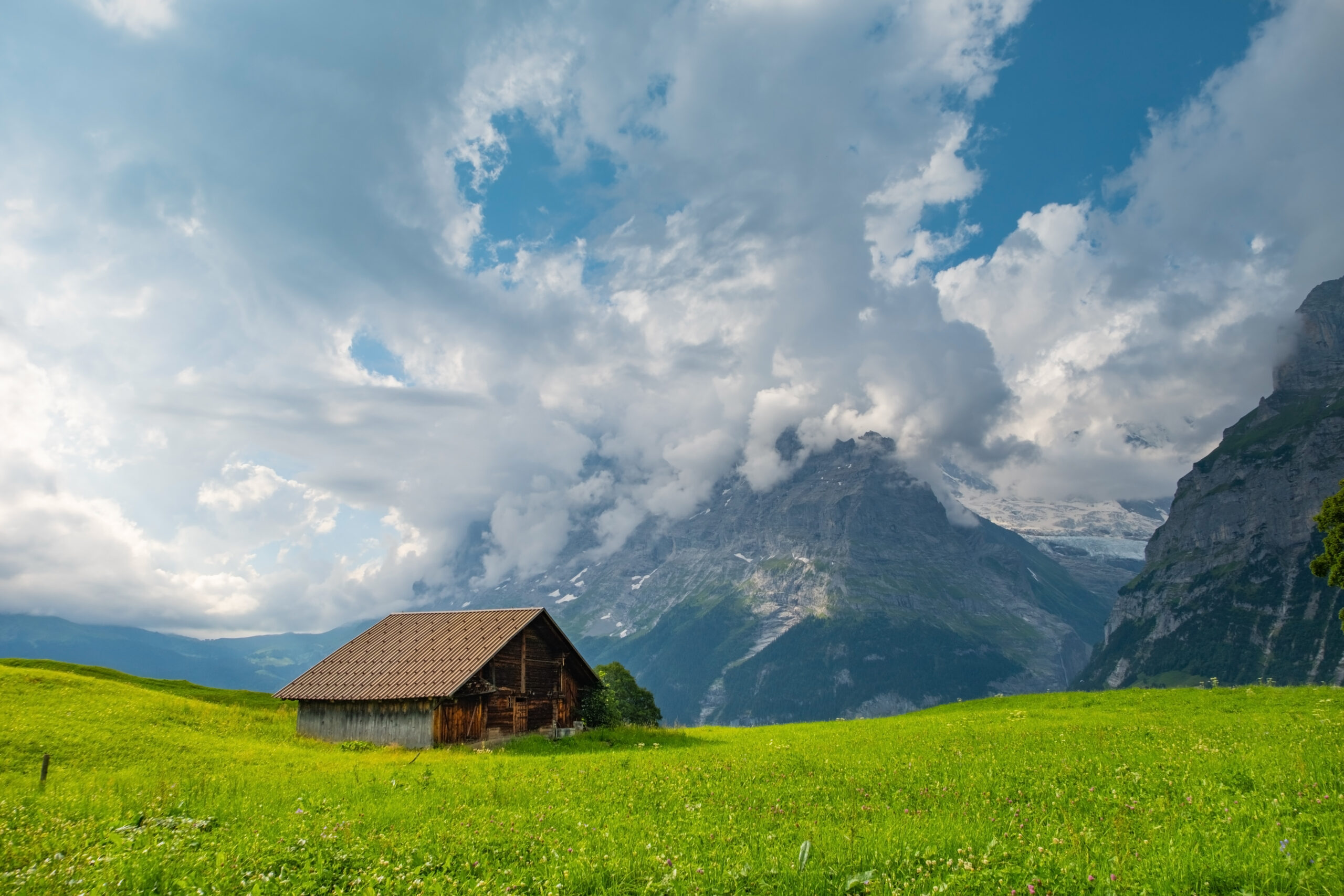 View on the alpine valley Grindelwald. Jungfrau, Switzerland. Under the Bernese alps. Mountain village